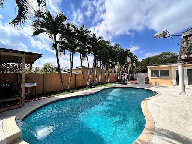 view of pool featuring a fenced in pool, a patio, and a fenced backyard