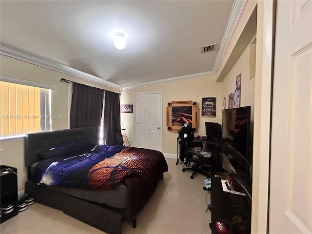 bedroom with crown molding, baseboards, and visible vents