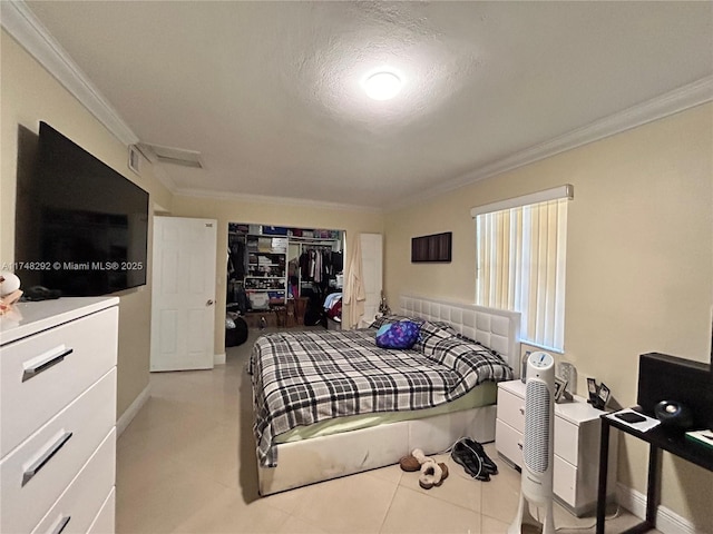 bedroom with tile patterned floors, baseboards, and ornamental molding