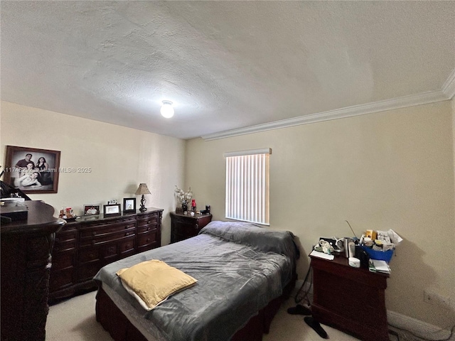 bedroom with carpet flooring, a textured ceiling, and crown molding