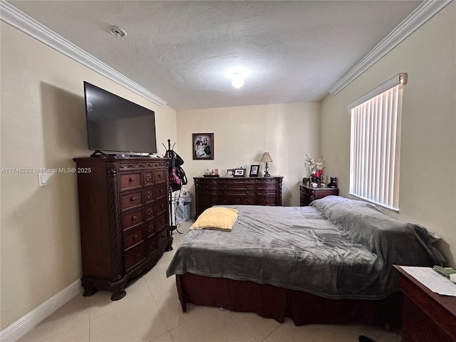 bedroom featuring light tile patterned floors, a textured ceiling, crown molding, and baseboards