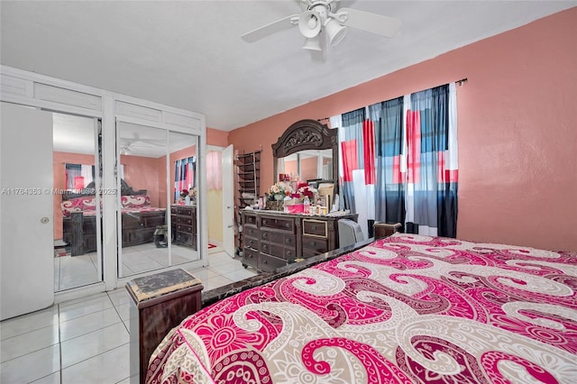 bedroom with tile patterned flooring and ceiling fan