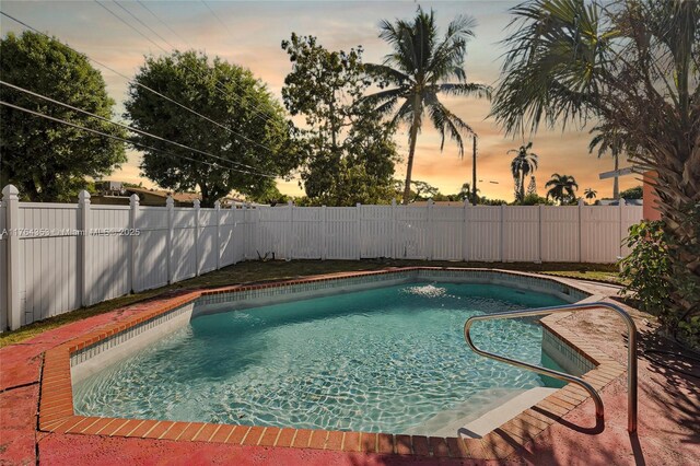 1412 NW 63rd Ave, Margate, FL 33063 - view of swimming pool featuring a fenced in pool and a fenced backyard