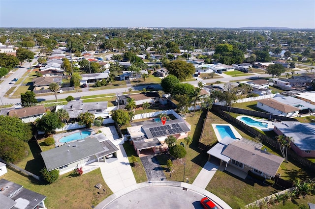 birds eye view of property with a residential view