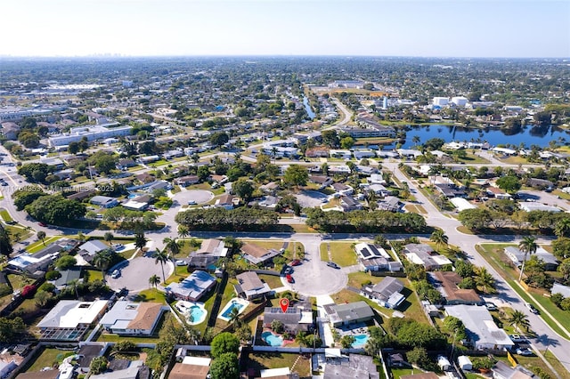 aerial view featuring a residential view and a water view