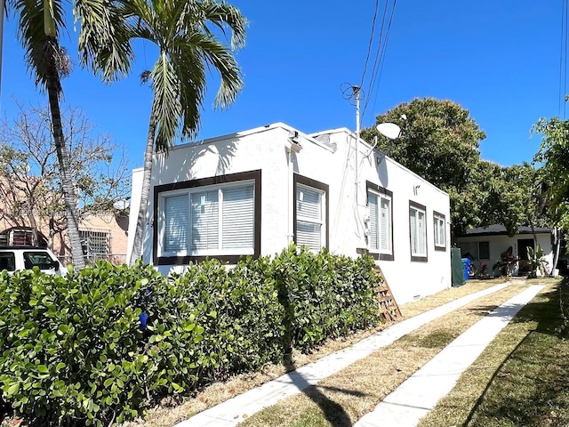 929 SW 12th Ave, Miami, FL 33130 - view of side of property featuring stucco siding
