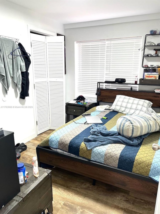 929 SW 12th Ave, Miami, FL 33130 - bedroom with wood finished floors and a closet