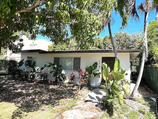 929 SW 12th Ave, Miami, FL 33130 - view of front of property with stucco siding and fence