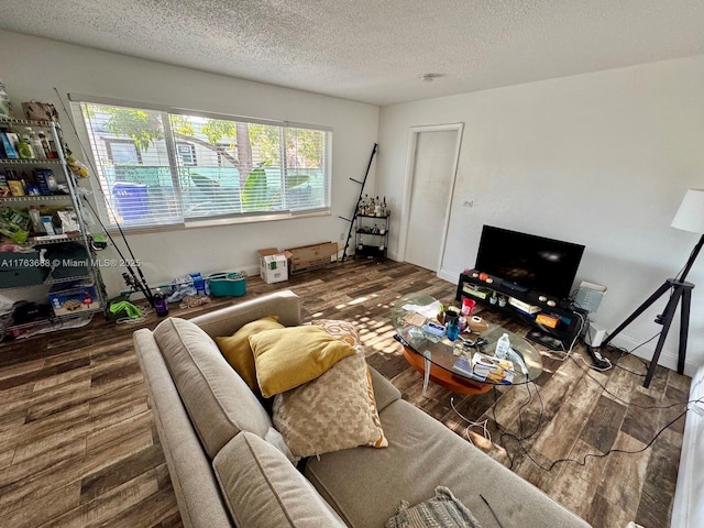929 SW 12th Ave, Miami, FL 33130 - living area with a textured ceiling and wood finished floors