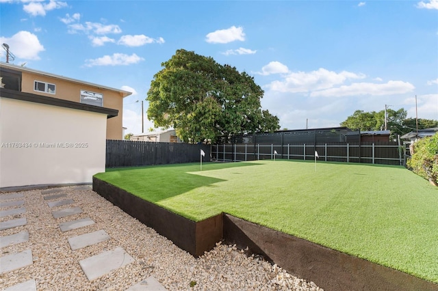 view of yard featuring fence