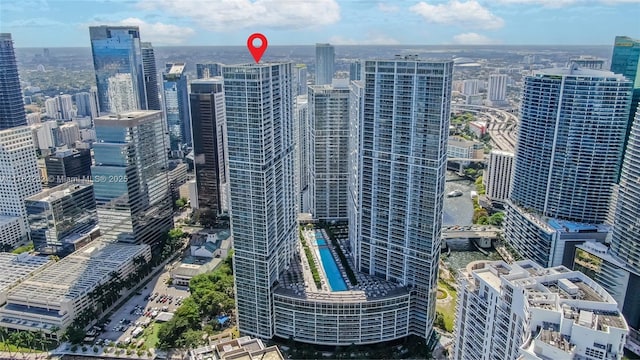 birds eye view of property featuring a view of city