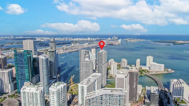 drone / aerial view with a view of city and a water view