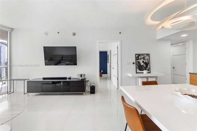 dining space featuring light tile patterned flooring