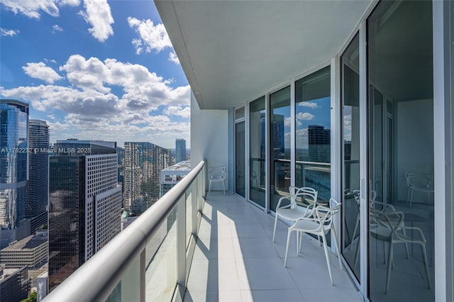 balcony featuring a view of city