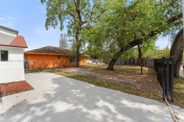 view of yard featuring a patio area and fence