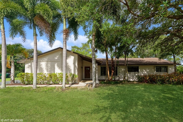 27820 SW 164th Ct, Homestead, FL 33031 - single story home with stucco siding and a front lawn