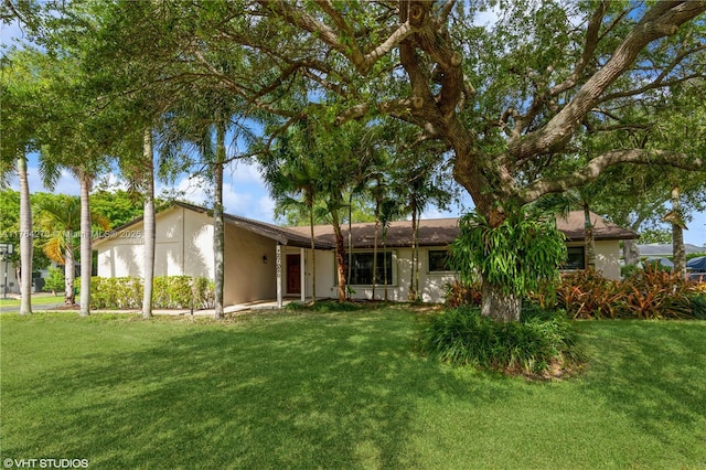 27820 SW 164th Ct, Homestead, FL 33031 - view of front of house with a front lawn and stucco siding