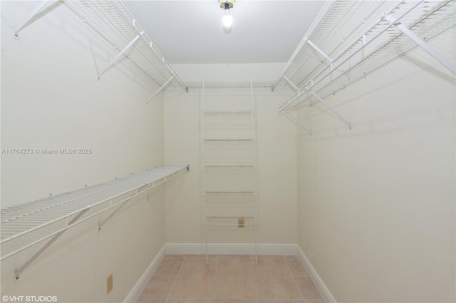 27820 SW 164th Ct, Homestead, FL 33031 - spacious closet with light tile patterned floors