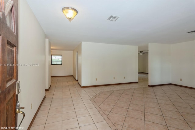 27820 SW 164th Ct, Homestead, FL 33031 - empty room featuring visible vents, baseboards, ceiling fan, and light tile patterned floors
