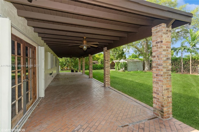 27820 SW 164th Ct, Homestead, FL 33031 - view of patio featuring ceiling fan, french doors, and an outdoor structure