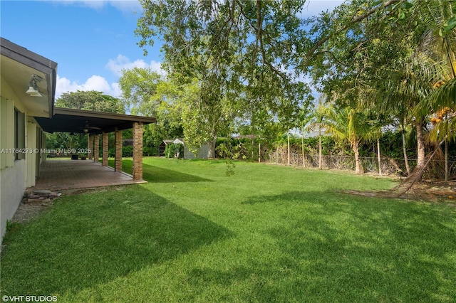 27820 SW 164th Ct, Homestead, FL 33031 - view of yard featuring a fenced backyard and a patio area