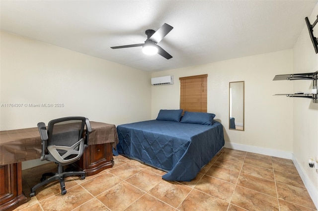 bedroom featuring baseboards, light tile patterned floors, an AC wall unit, and ceiling fan