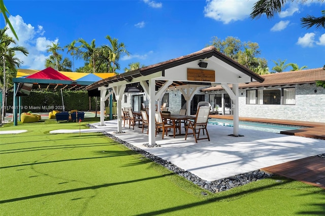 view of patio with a gazebo and an outdoor pool