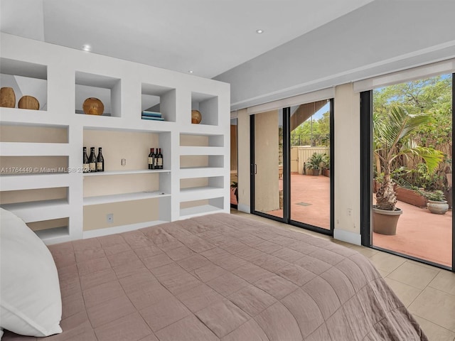 unfurnished bedroom featuring tile patterned floors, access to outside, and recessed lighting