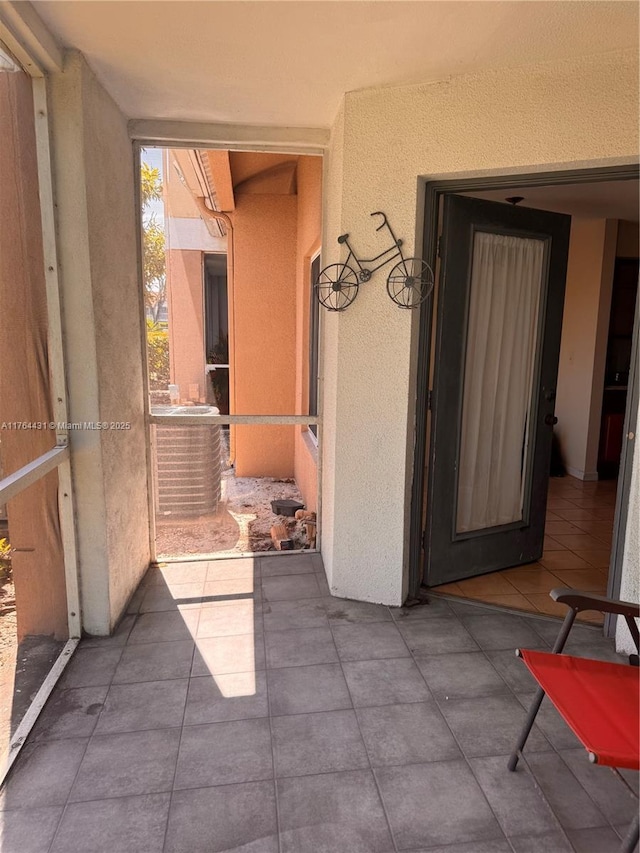815 W Boynton Beach Blvd Unit 6-103, Boynton Beach, FL 33426 - view of patio featuring cooling unit