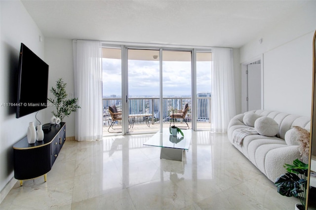 living area featuring a wall of windows, a view of city, and marble finish floor