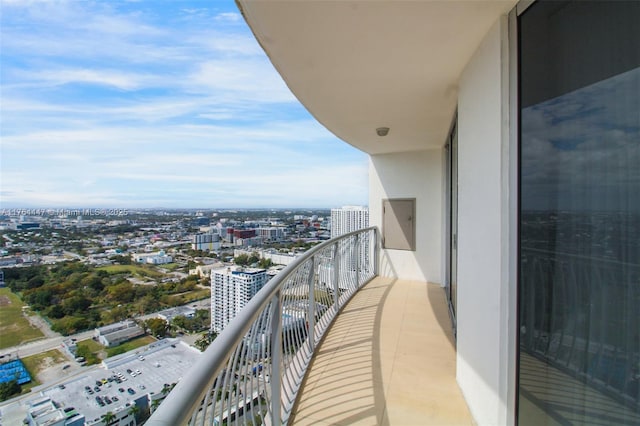 balcony featuring a city view