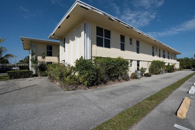 view of property exterior with stucco siding