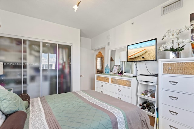 bedroom with visible vents