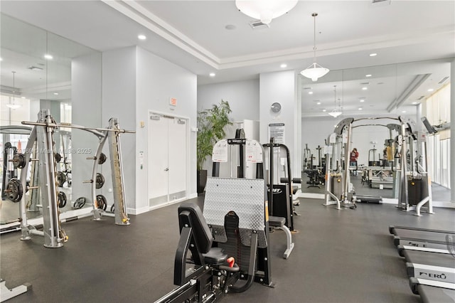 exercise room featuring recessed lighting and visible vents