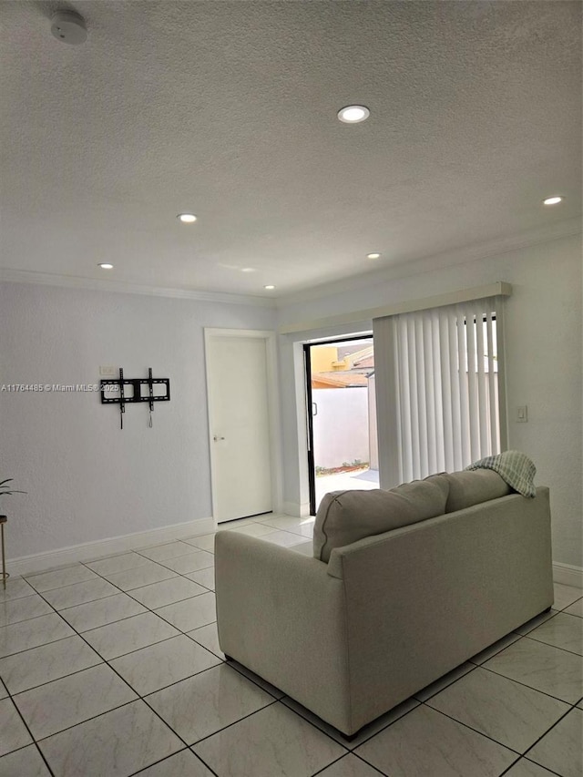 living area featuring light tile patterned floors, recessed lighting, a textured ceiling, and baseboards