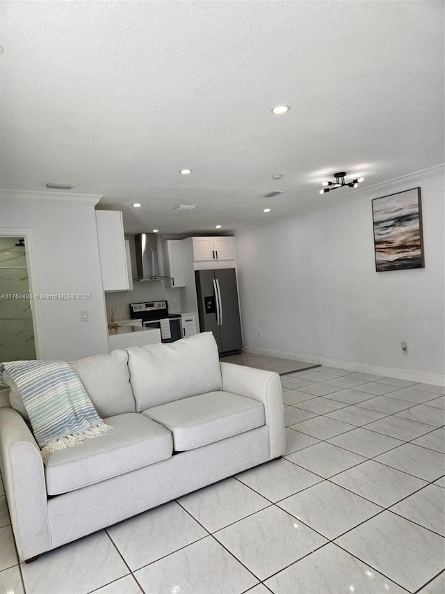 living room featuring recessed lighting, baseboards, and ornamental molding