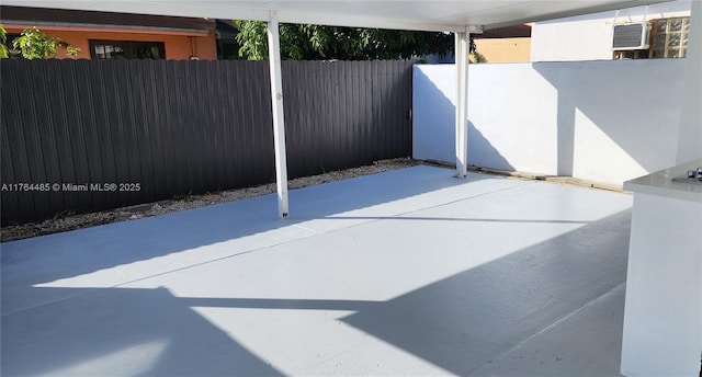 view of patio with fence