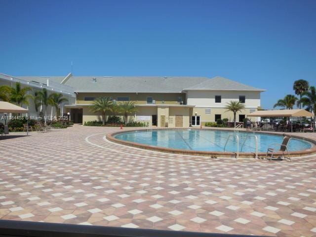 pool with a patio