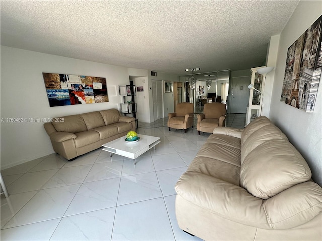 living area with a textured ceiling