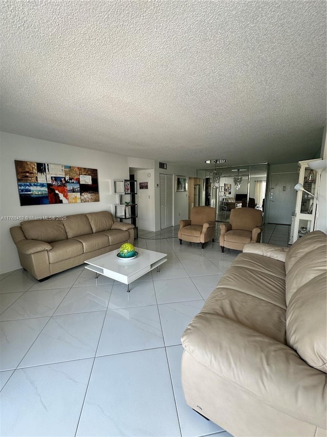 living room featuring a textured ceiling