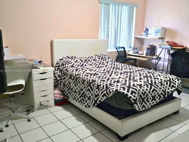 bedroom featuring light tile patterned floors