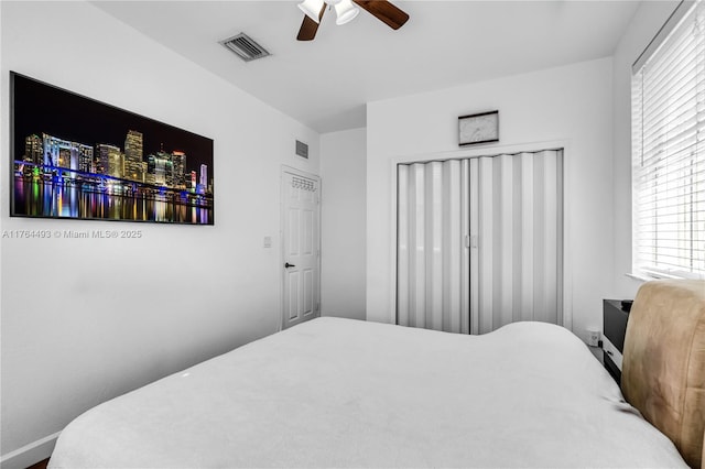 bedroom with visible vents and ceiling fan