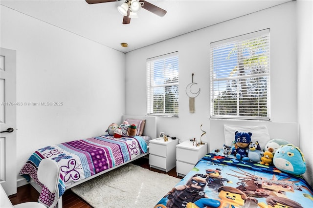 bedroom featuring ceiling fan and wood finished floors