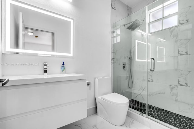 full bathroom featuring a marble finish shower, marble finish floor, toilet, and vanity