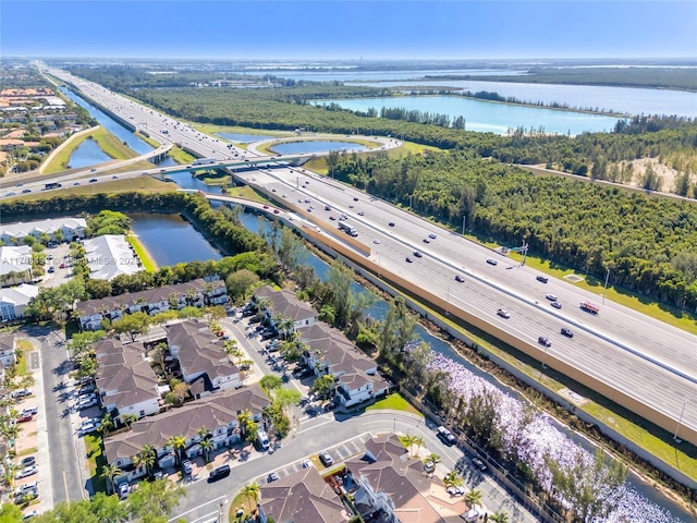 drone / aerial view featuring a water view