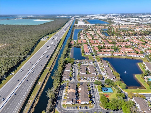 drone / aerial view with a water view