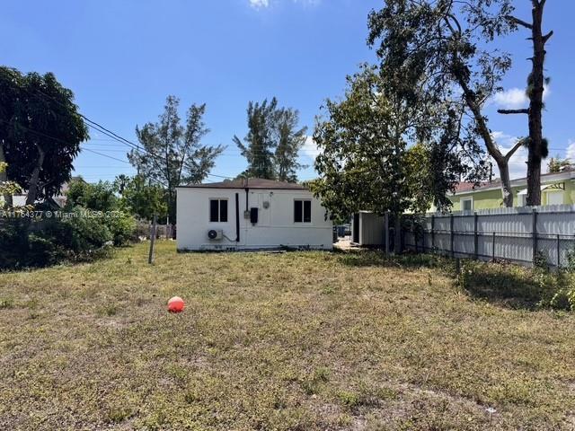 view of yard with fence