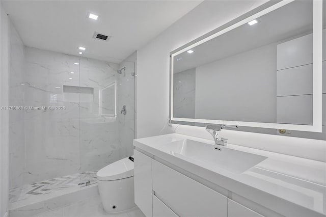 bathroom with vanity, visible vents, a marble finish shower, toilet, and marble finish floor