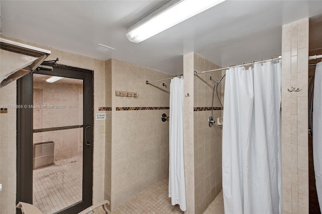 full bathroom with a stall shower