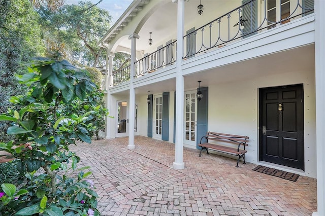 view of patio / terrace with a balcony